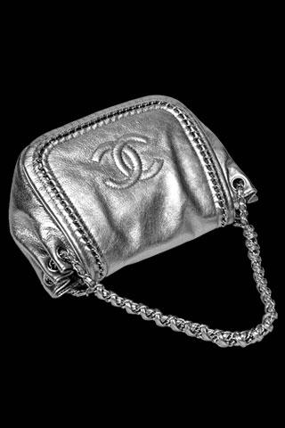 Luxury by chanel metallic silver chain bag.jpg